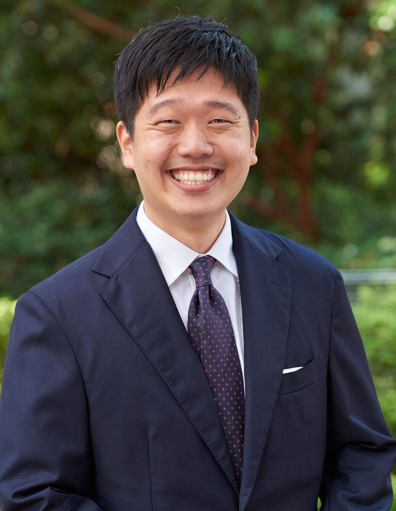 Headshot of Jeesoo Nam, Assistant Professor of Law and Philosophy at USC Gould School of Law, smiling outdoors.